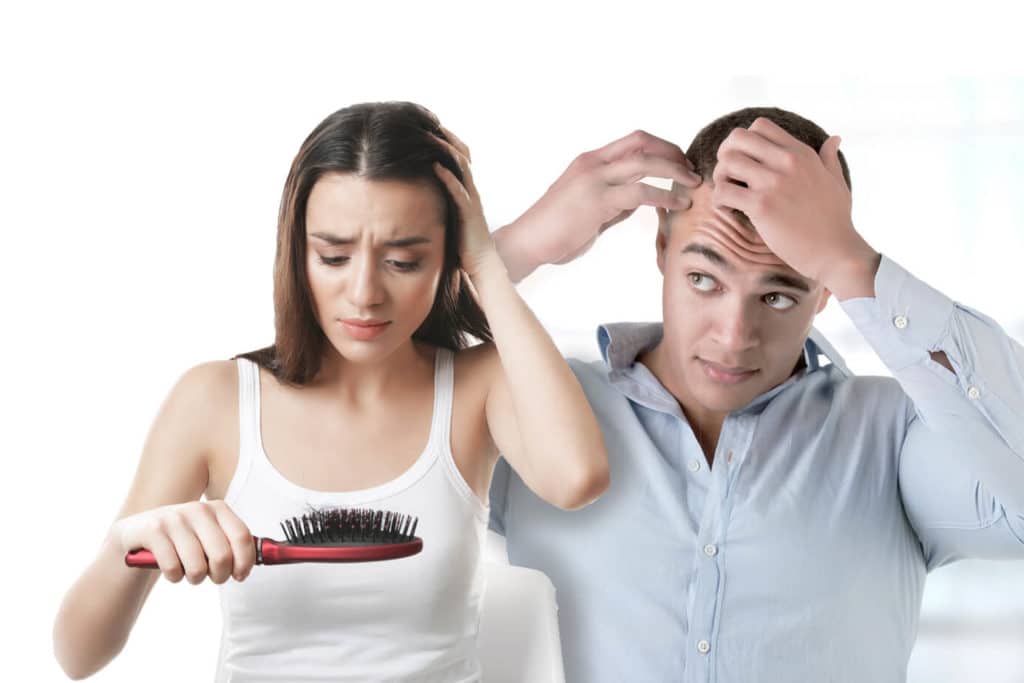 Мужчина и женщина с выпадающими волосами