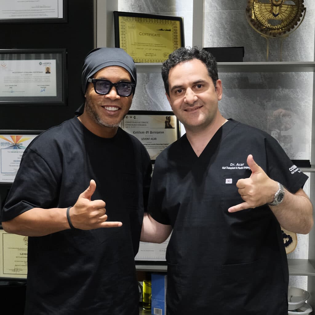 Ronaldinho posing with Dr Acar