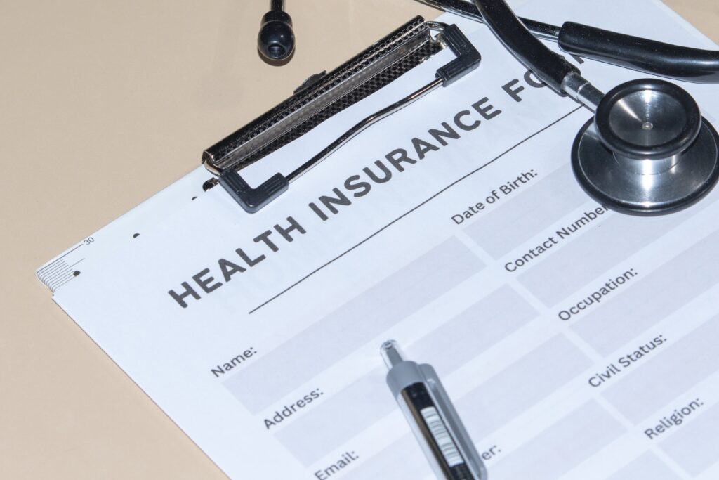 Photo of a health insurance form for checking insurance coverage for hair transplant surgery