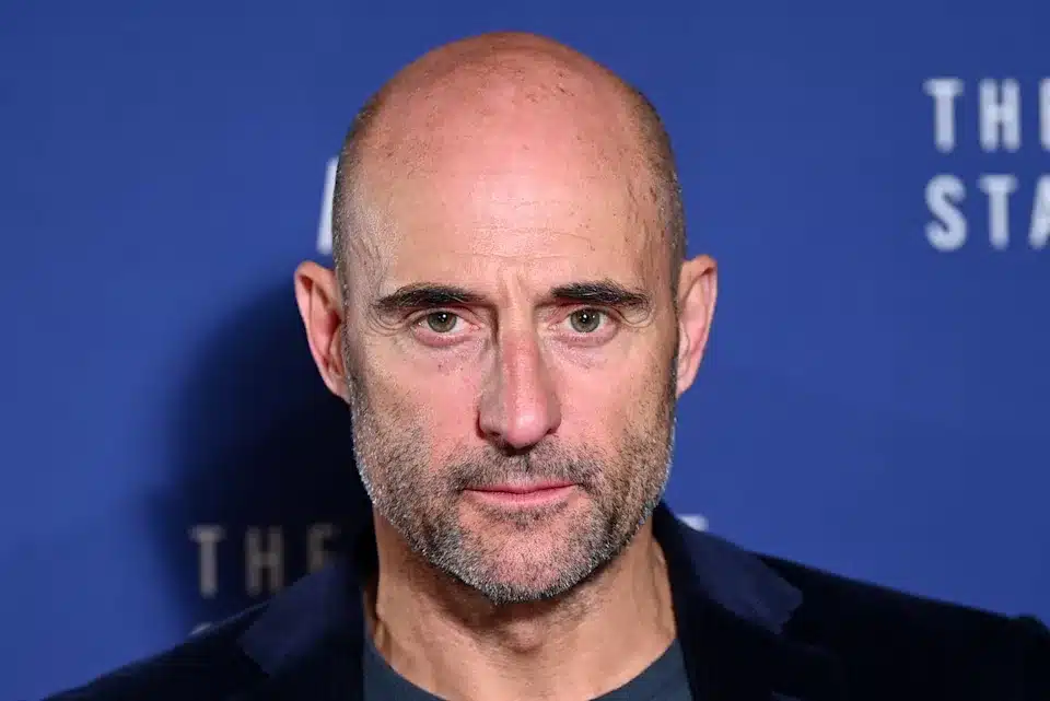 Mark Strong showing off his bald head