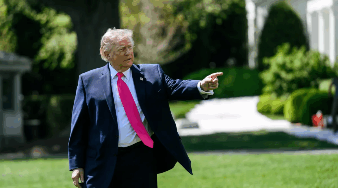 Picture of Donald Trump waving his hand in a direction