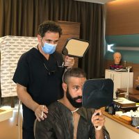 Canadian baseball player, Dalton Pompey, during his hair transplant consultation with Dr. Levent Acar at Cosmedica Clinic