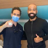 Canadian baseball player, Dalton Pompey, and Dr. Levent Acar at Cosmedica Clinic